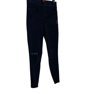 SPANX black skinny distressed jeans. Size M/6